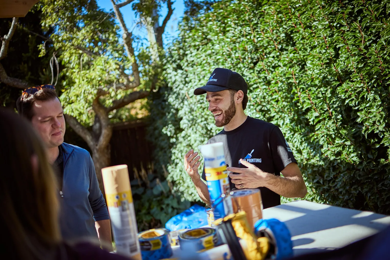 Professional painters working on house exterior painting project in Victoria