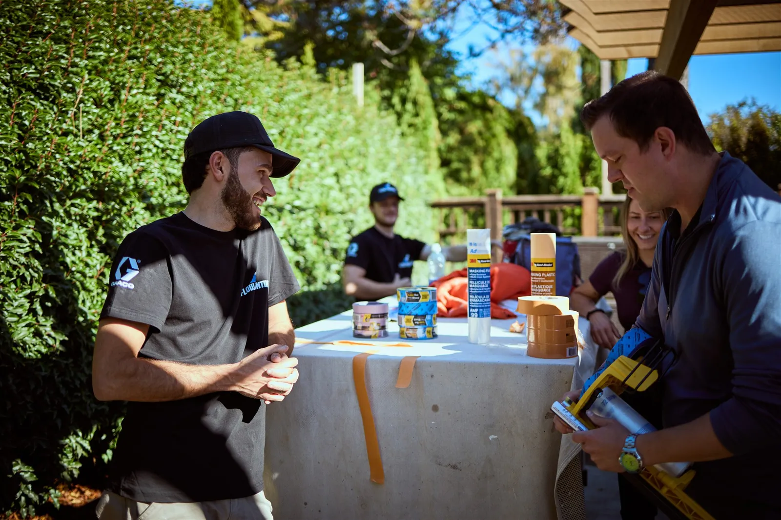 Flow Painting crew applying exterior paint to Victoria BC residential home