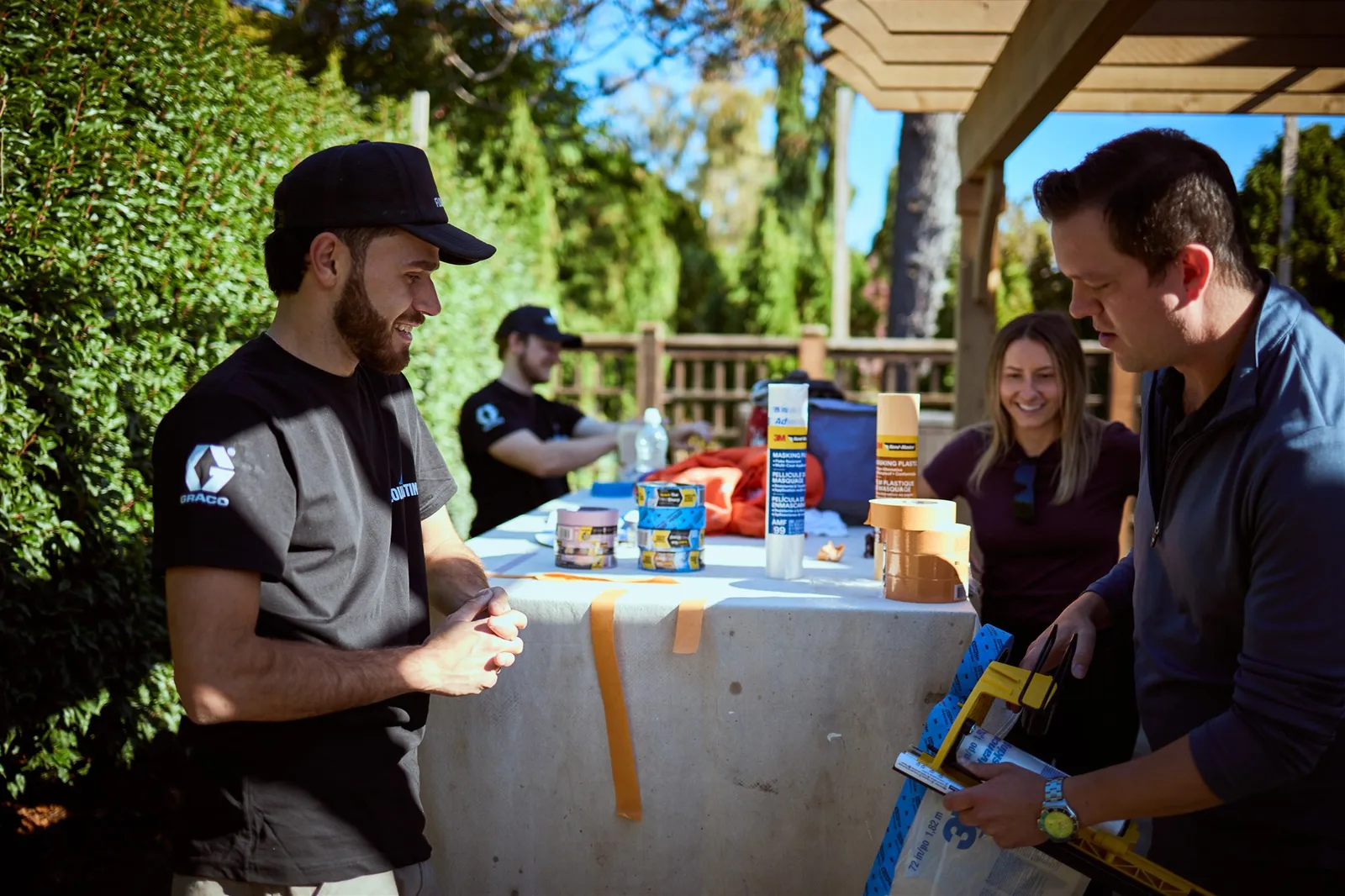 Professional painters working on house exterior painting project in Victoria