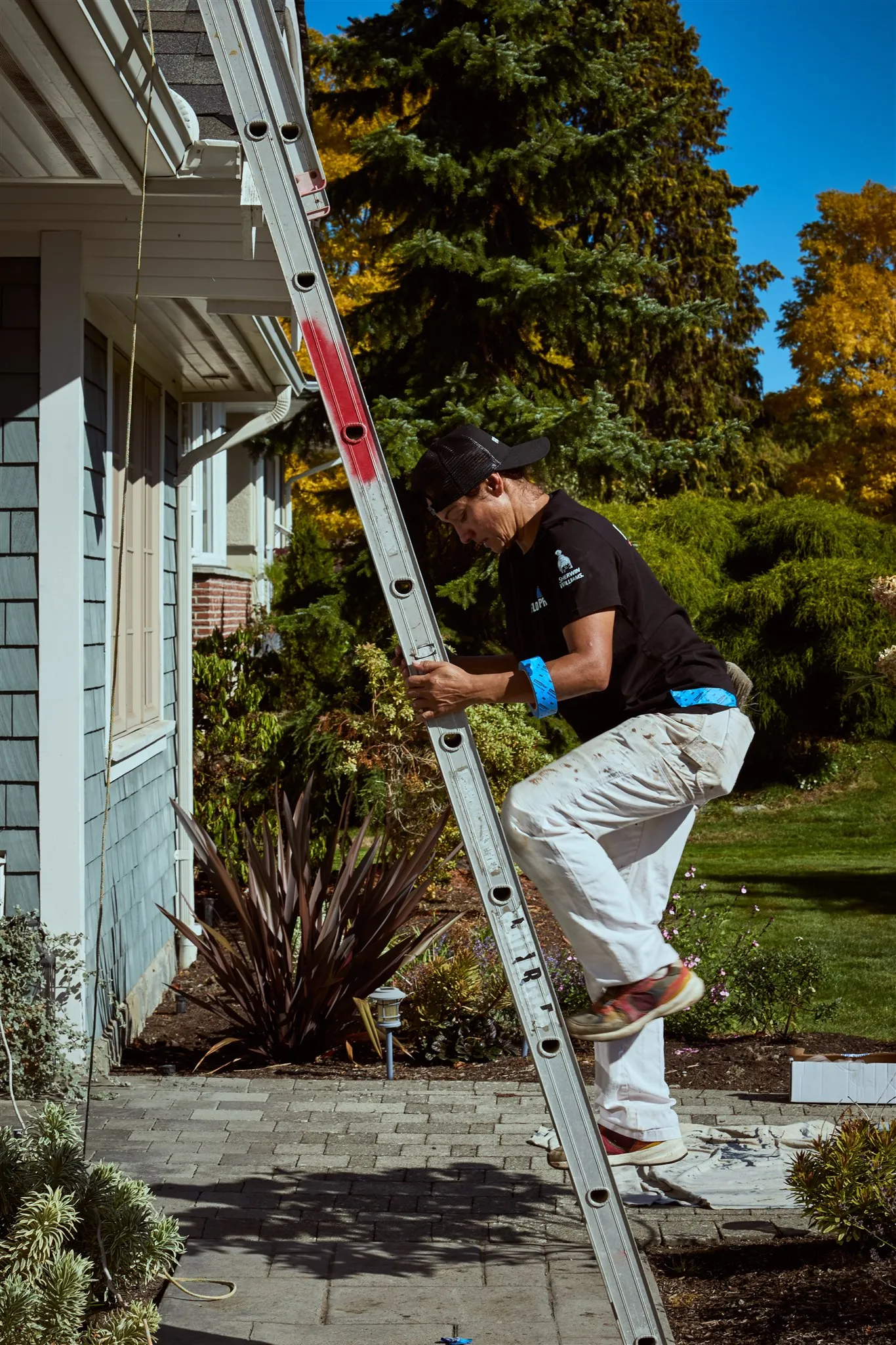 Flow Painting crew applying exterior paint to Victoria BC residential home