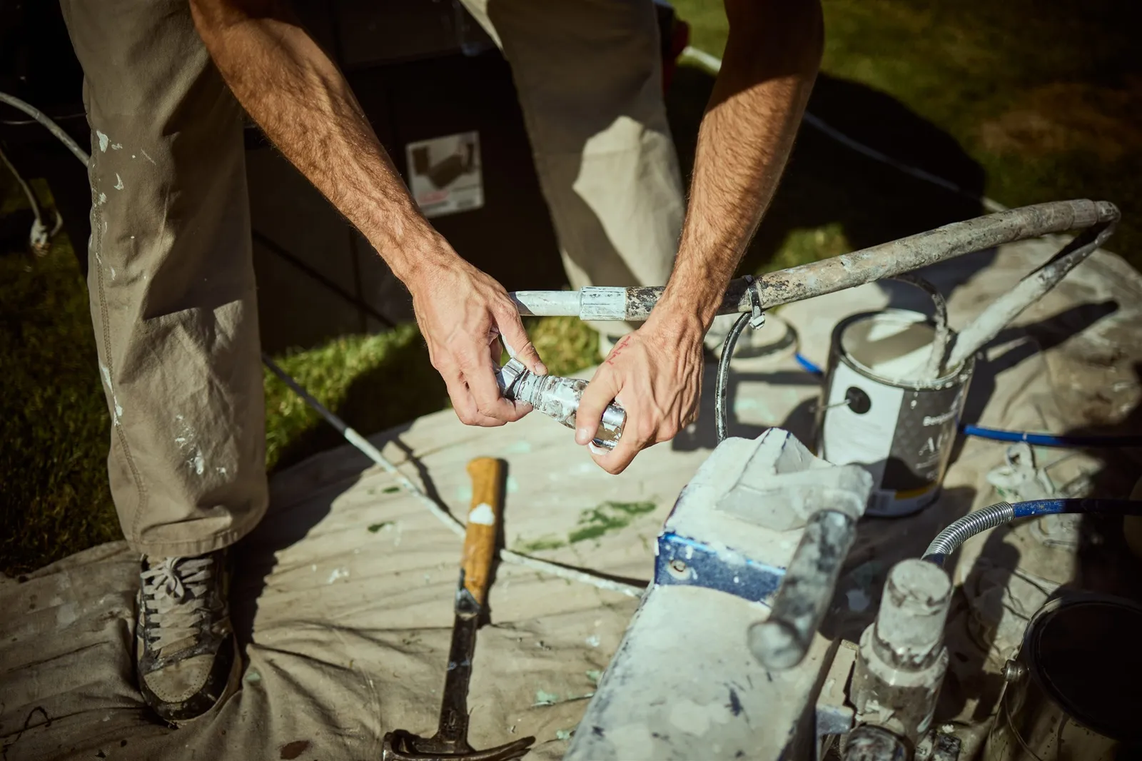 Professional painters working on house exterior painting project in Victoria