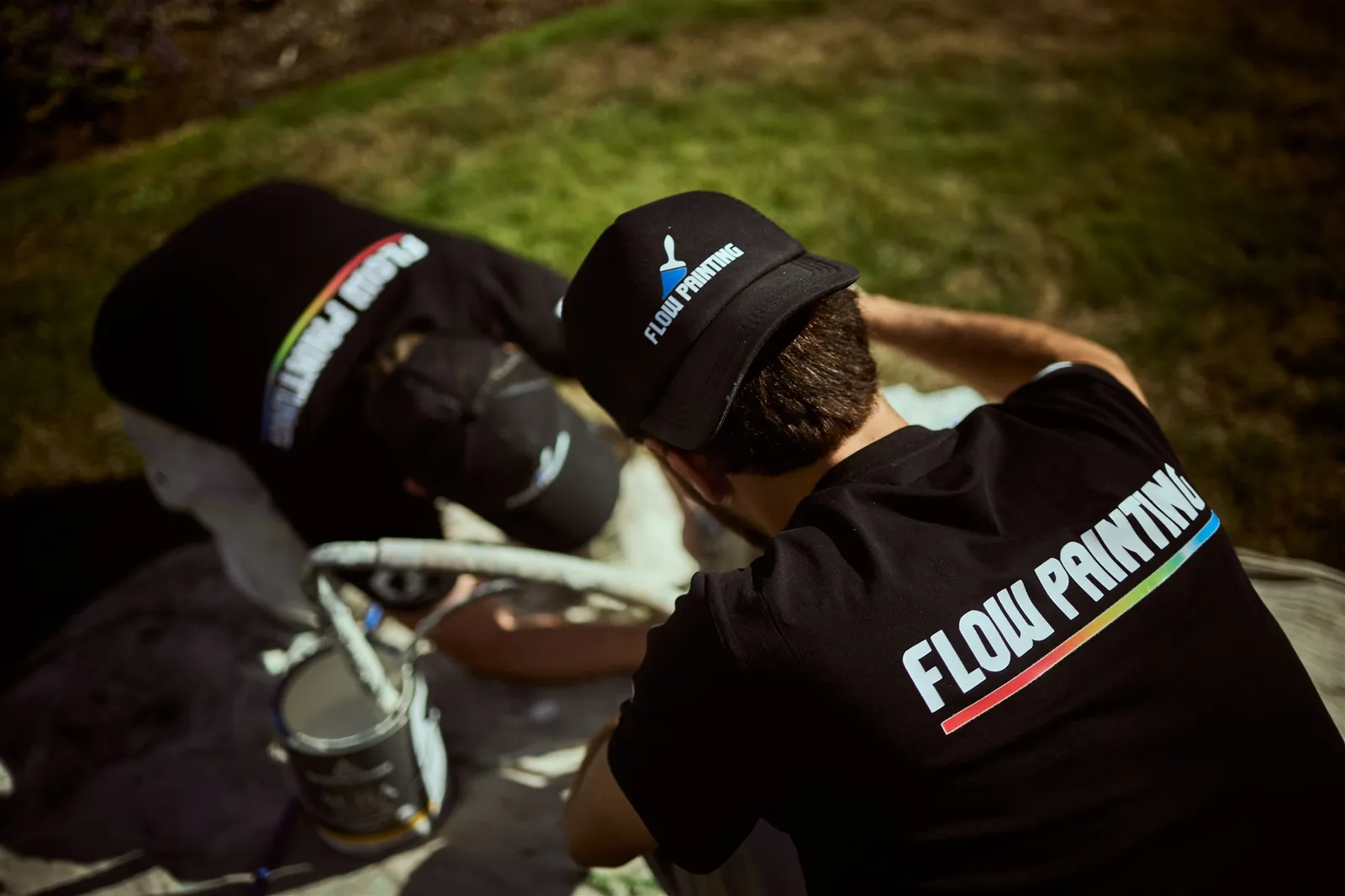 Flow Painting crew applying exterior paint to Victoria BC residential home