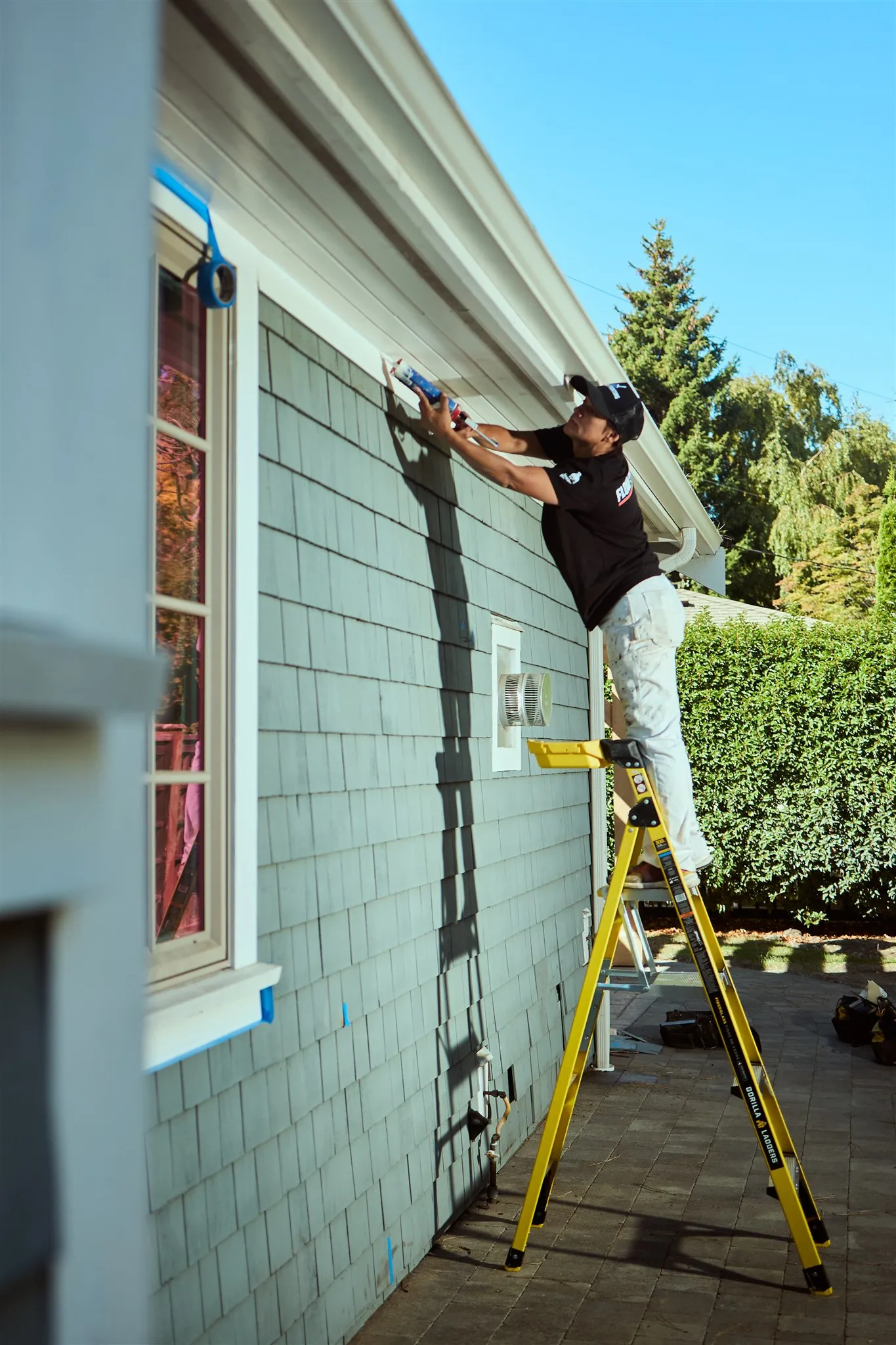 Detailed exterior trim painting work on Victoria heritage home