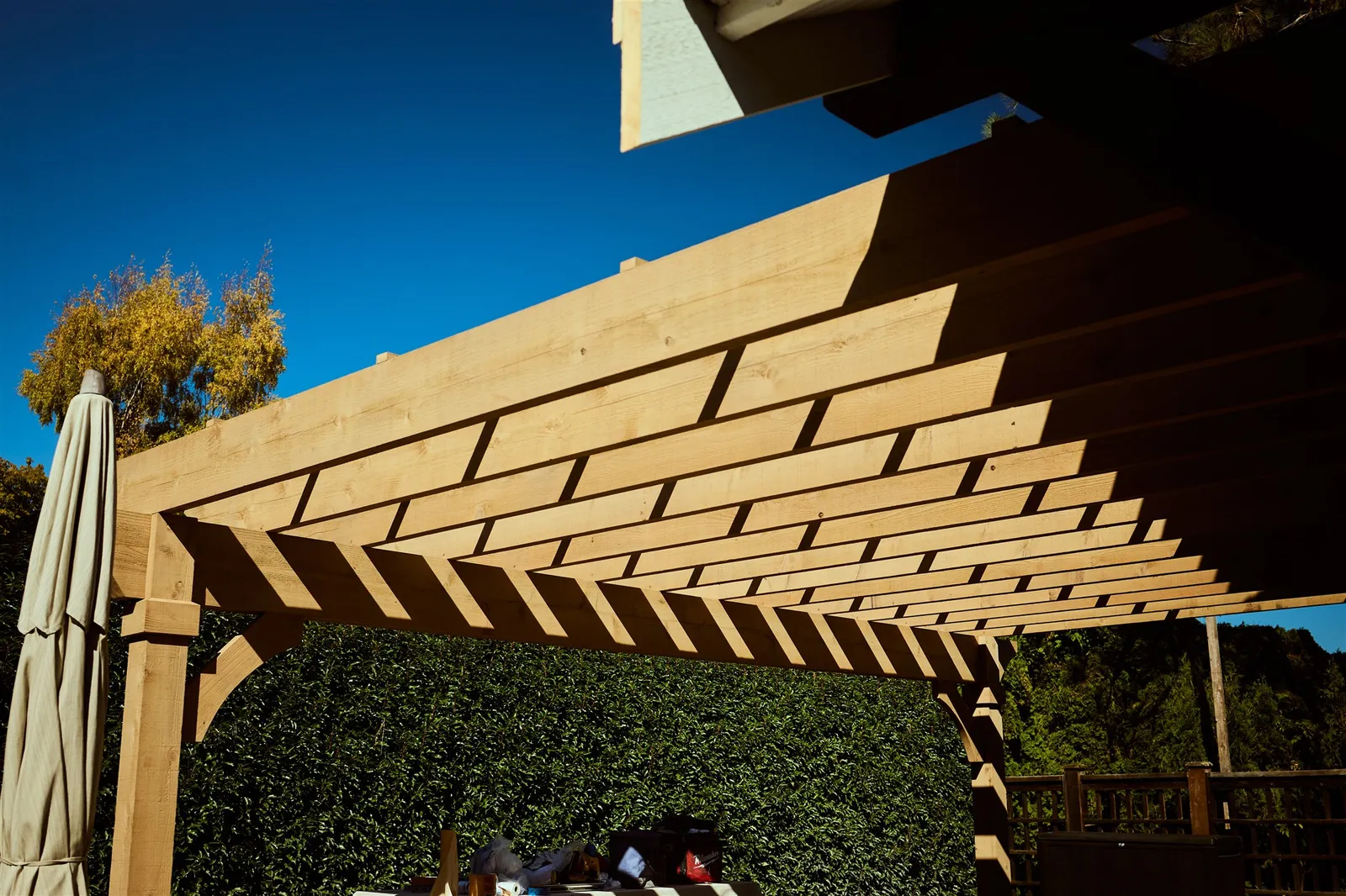 Professional painters working on house exterior painting project in Victoria