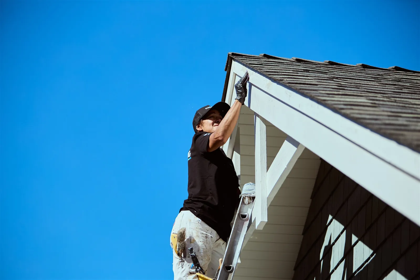 Detailed exterior trim painting work on Victoria heritage home