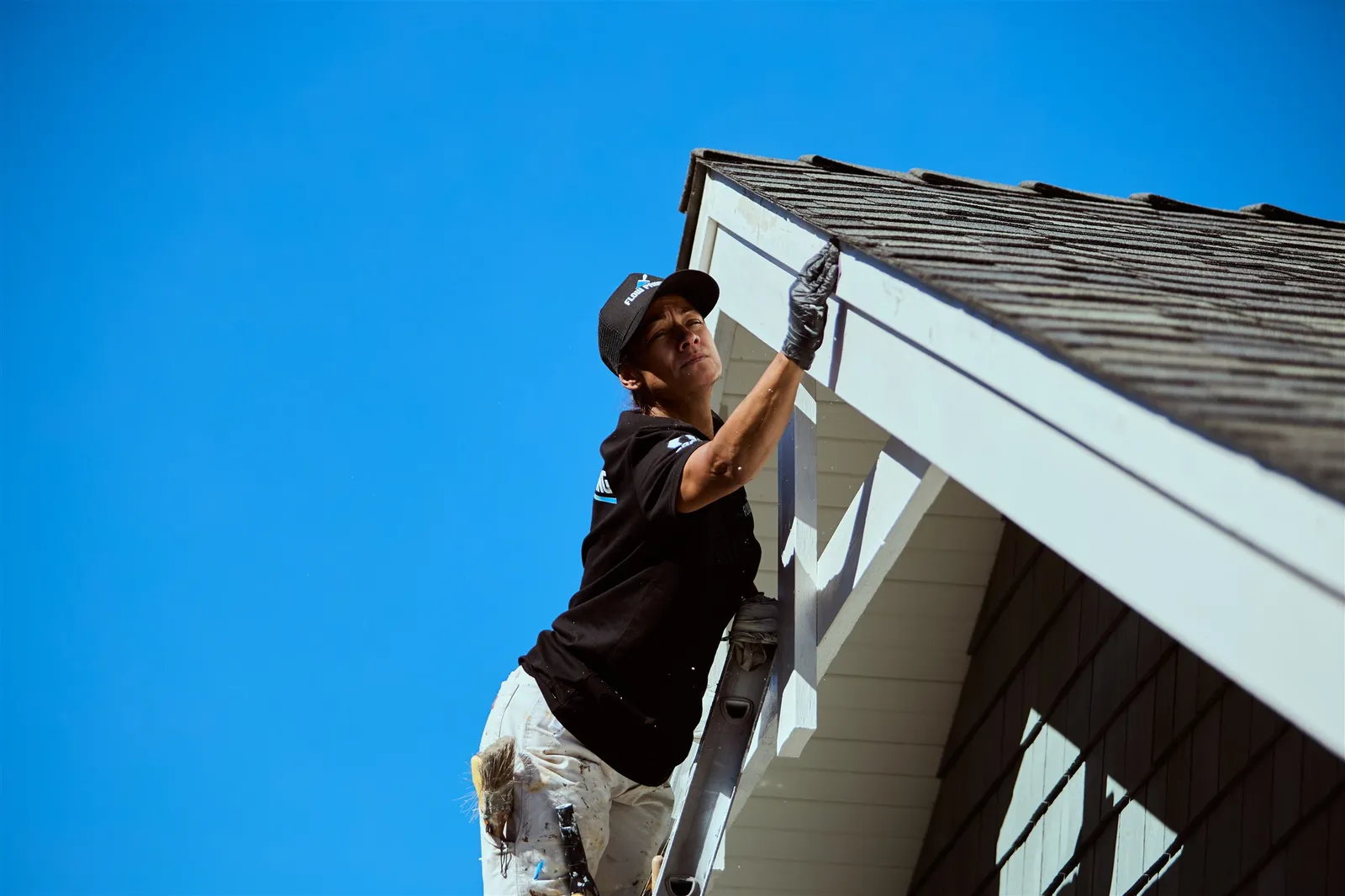 Flow Painting crew applying exterior paint to Victoria BC residential home