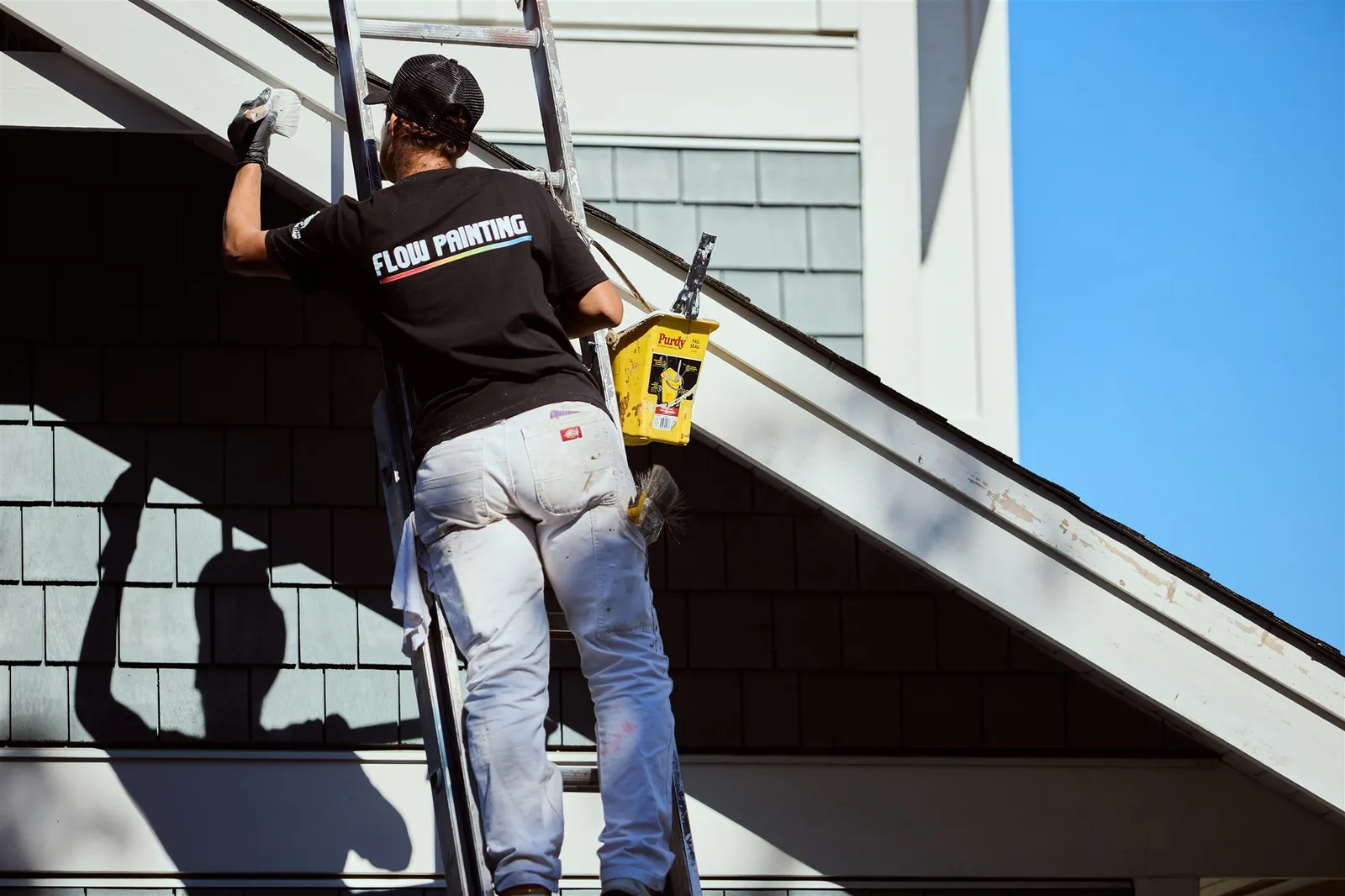 Flow Painting crew applying exterior paint to Victoria BC residential home